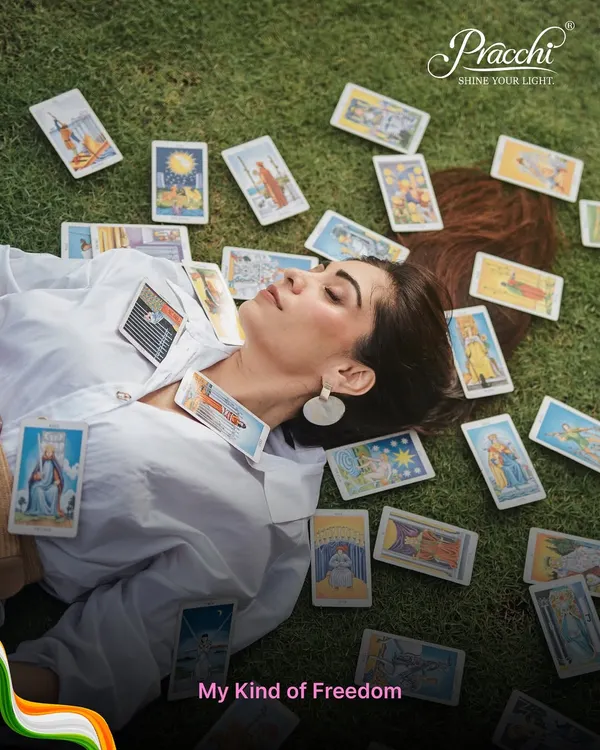 This image captures the essence of my connection with tarot. Lying on the grass, surrounded by cards, I found my own kind of freedom. It's a reminder that the answers we seek are often found when we connect with ourselves and the universe.