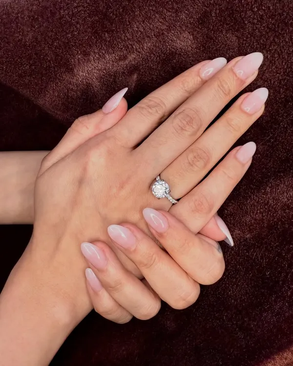 There is nothing more timeless than a soft, natural-looking set. These almond-shaped extensions feature a delicate baby boomer or ombré effect, blending a milky white tip into a soft pink base for a clean and sophisticated finish.