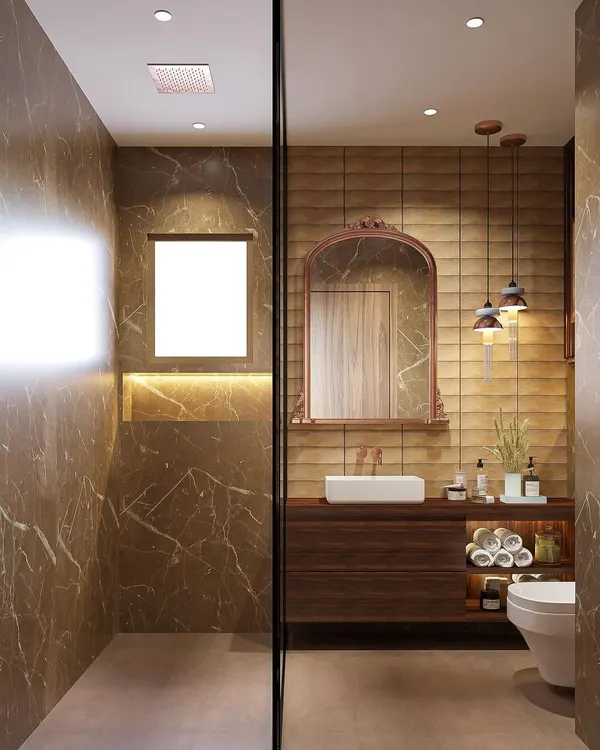 A warm and inviting bathroom design. I used brown marble-look tiles for the shower area and textured tiles behind the vanity, complemented by a vintage-style mirror and pendant lights for a cozy, rustic feel.
