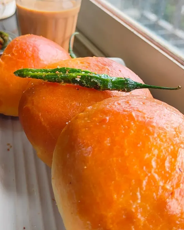 I found a healthier version of your favorite snack: the Baked Vada Pav. Served with a green chili, it's the perfect accompaniment to a cup of chai.