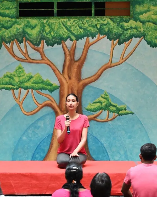 Leading a session for the staff at Christ University. My goal is to make yoga feel instructional and beneficial, not intimidating. I focus on clear guidance for every posture and breathing technique.