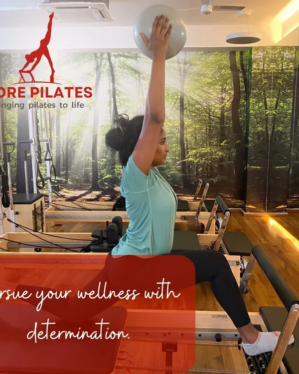 Pursue your wellness with determination. Using a stability ball during this reformer exercise adds a challenge to the core and improves balance.