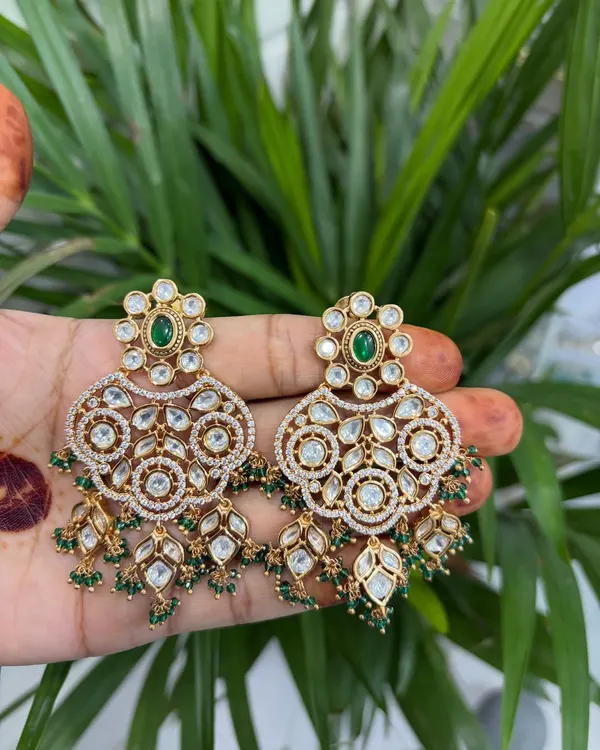 These oversized chandbali earrings are a statement in themselves. Rent them to elevate a simple outfit for a wedding reception or sangeet.