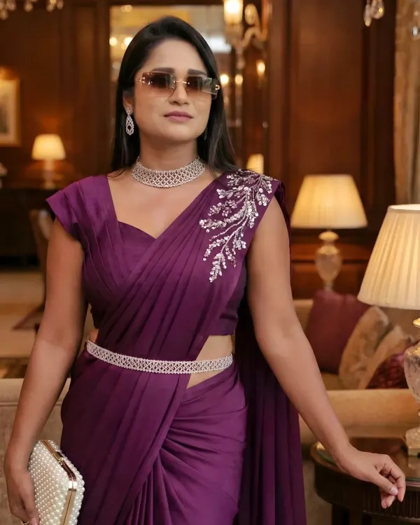 A moment of elegance at the Jai Mahal Palace. I believe an anchor's style should be as memorable as the event itself. This look, featuring a modern saree, is perfect for upscale corporate gatherings.