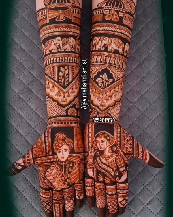 This is the kind of detailed bridal portrait work I love to do. We can feature the bride and groom on each hand, surrounded by traditional wedding motifs like the doli and elephants, creating a beautiful story on your arms.