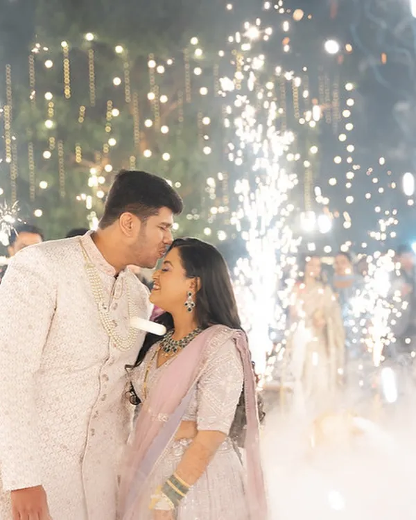 This is the magic I love to create. For this couple's reception, we went for a look that was both timeless and radiant, ensuring the bride glowed as brightly as the sparklers around them. It’s all about capturing that perfect moment.