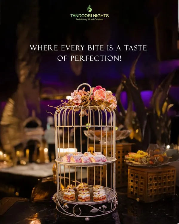 Where every bite is a taste of perfection. Our dessert displays are a feast for the senses, like this beautiful birdcage stand holding an assortment of delicate Indian sweets and pastries.
