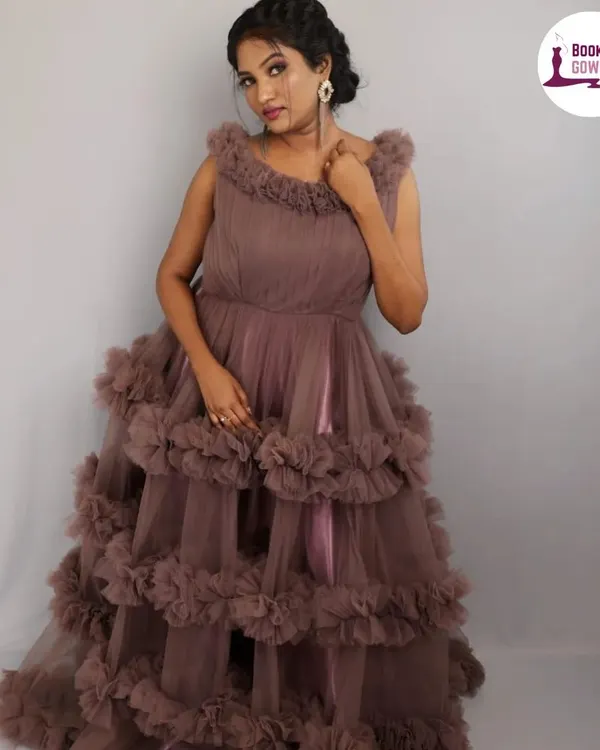 A full-length view of my mauve ruffle gown. The tiered ruffles create a beautiful, textured look that's both elegant and fashionable for photoshoots.