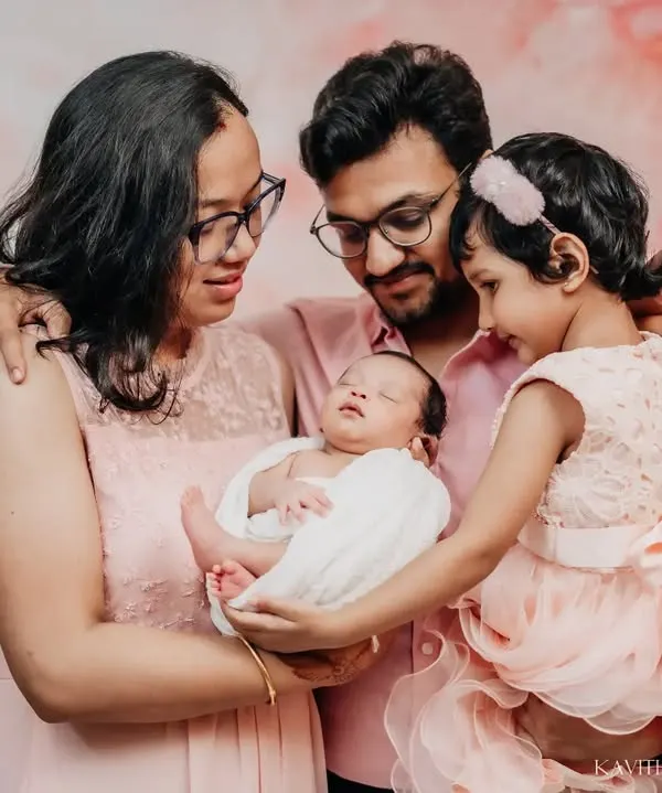 This is what it's all about. A family complete, holding their newest member. I focus on capturing that overwhelming love and connection in these first few weeks.