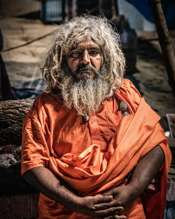 This is one of my favorite portraits from the Maha Kumbh. To capture authentic moments, I believe you have to get close and build a connection, even if it's brief. The intensity in his eyes tells a story that words cannot.