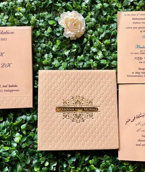 An elegant Nikah invitation in a classic beige and gold color scheme. This set includes an insert with beautiful Arabic calligraphy.