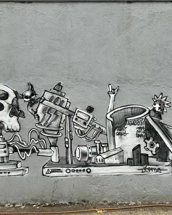 A full shot of a piece from a Sunday painting session, showcasing my mechanical and goth style. It features a cow skull, intricate machinery, and characters from pop culture, all rendered in a monochrome, dirty style.
