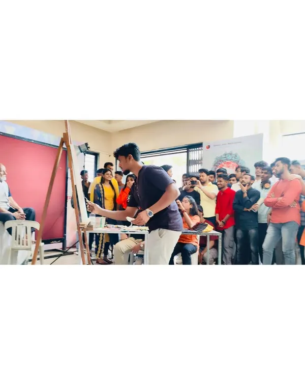 A live painting demonstration in progress at Abhinav Kala Mahavidyalaya in Pune. You can see the students gathered to observe the process, which is a core part of my educational workshops.