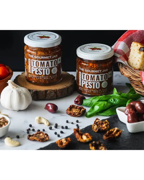 For The Gourmet Jar's Sundried Tomato Pesto, I created a rustic, Italian-inspired scene. The shot includes ingredients like sun-dried tomatoes, olives, and fresh bread to show how the product can be enjoyed.