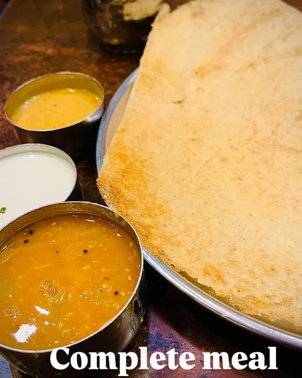 A classic South Indian meal of dosa with sambar and chutneys is a perfect example of a complete meal. The fermented dosa is great for gut health, while the lentil based sambar provides protein and fiber, making it a balanced and nutritious choice.
