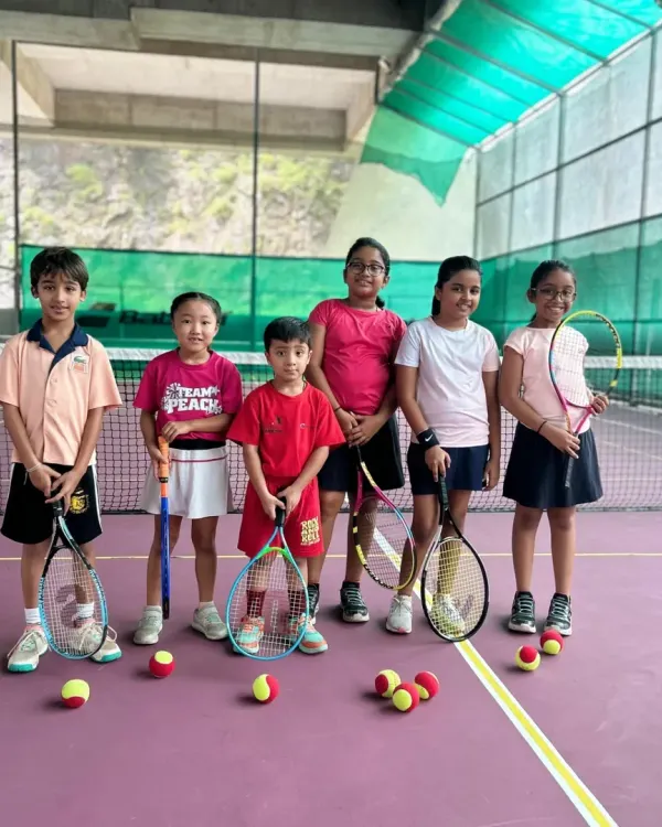A group of our Red Batch stars ready for action. We focus on creating a supportive and energetic environment where kids can build confidence and make friends.