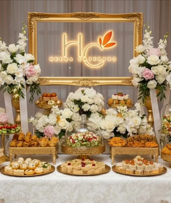 A stunning display of our luxury dessert and appetizer catering. We believe presentation is just as important as taste, so we create beautiful, abundant spreads with floral arrangements and elegant serveware that become the centerpiece of your celebration.