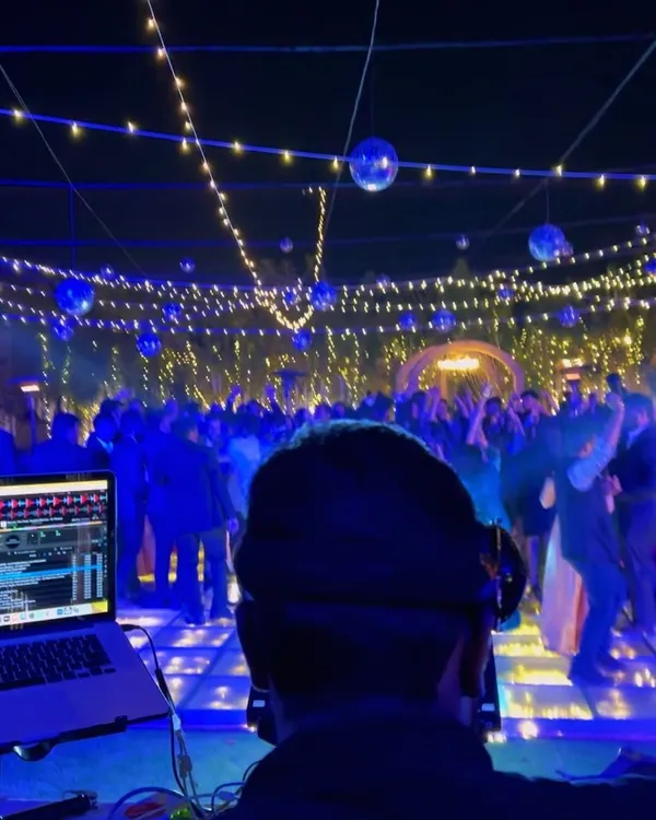 A beautiful sangeet night in Rajkot, Gujarat. I travel all over India for destination weddings, bringing my complete professional setup to create an incredible party atmosphere with stunning lighting and sound.
