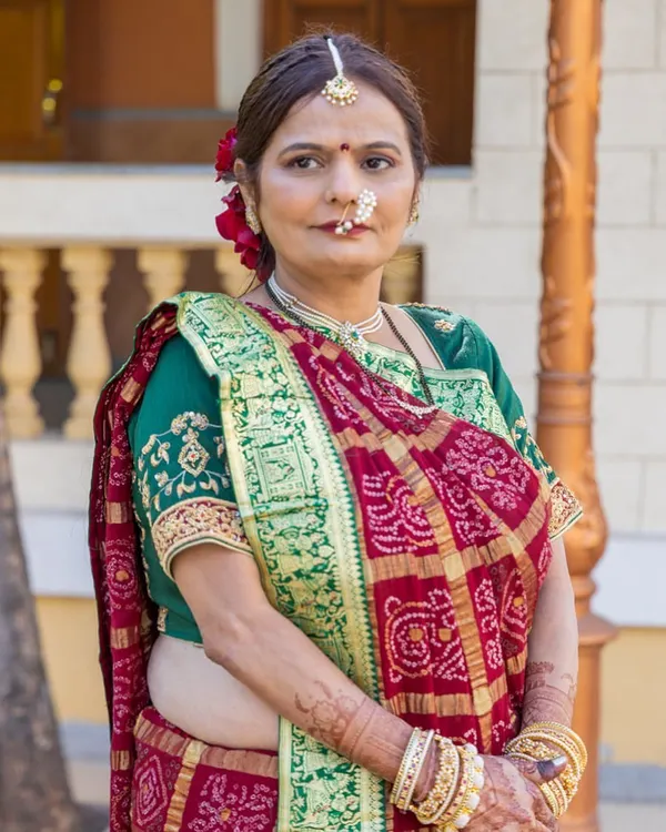 A beautiful, elegant makeup look for my own mother. I focused on creating a fresh, lifted appearance with soft colors that complemented her traditional Gujarati saree, ensuring she looked graceful and radiant.