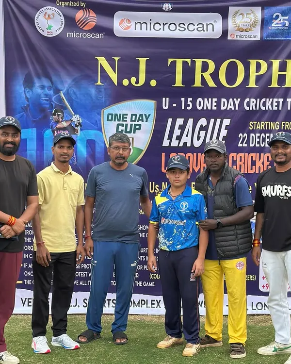 The opening ceremony of the N.J. Trophy U-15 cricket tour, with organizers and a young player posing in front of the official banner.