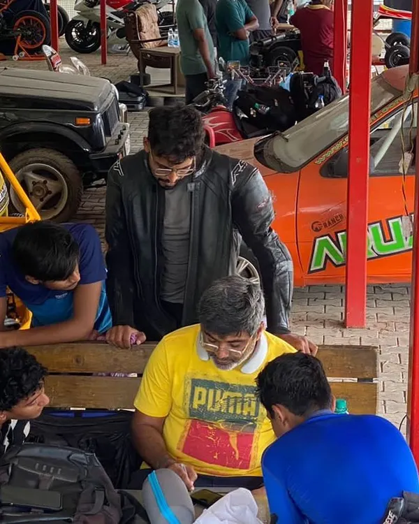 Here I am with a group of students during a theory session. We gather around to discuss the plan for the day, review feedback, and answer every question to ensure the concepts are clear.