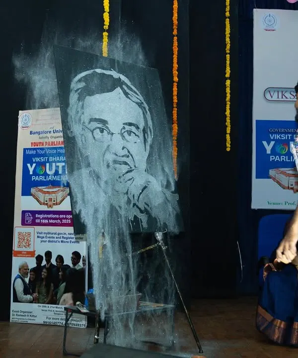 A moment during my speed painting performance at Bangalore University. I'm using quick, broad strokes to build the foundation of the portrait before the final details are added.