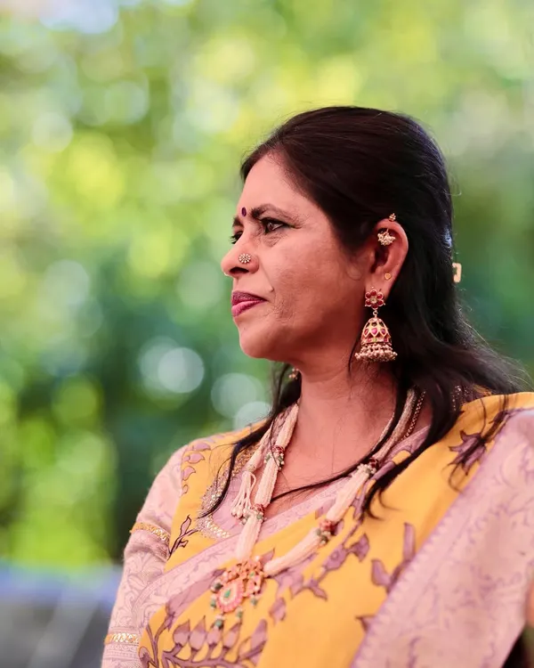 A closer look at my handcrafted pearl and navratna stone necklace. I designed this piece to pair with a special yellow and lavender saree for a wedding.