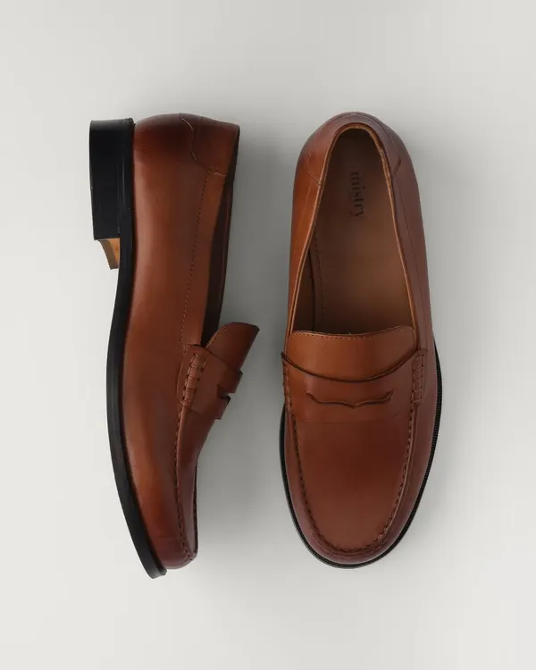 Introducing my unisex loafers, hand-stitched in beautiful, top-grain tan leather. This is a true classic, designed with a cushioned sole to be a comfortable and enduring staple for workwear or weekend style.