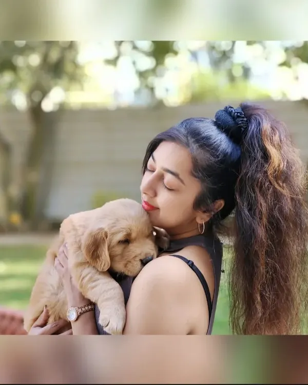There is nothing like the special bond of puppy love. Cuddling this little Golden Retriever reminds me why I started this journey. It's all about the love for animals.