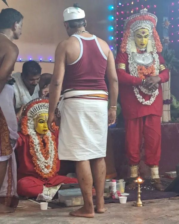 A Bhoota Kola performer in Kundapura, fully adorned and ready for the ritual. Witnessing the transformation of the artist as the 'daiva' or spirit enters them is a profound experience.
