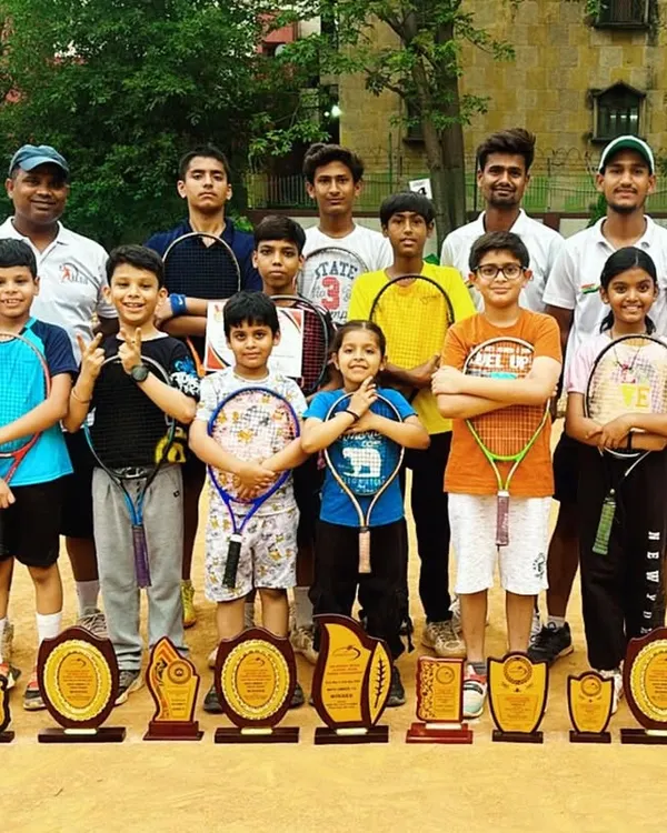A proud moment for the entire academy. Our players and coaches celebrating a successful run at the Delhi/NCR Inter-School Open Tennis Tournament with a huge collection of trophies.
