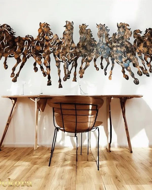 A full view of the 7 Horses metal wall art, a piece that symbolizes strength and momentum. Its intricate, laser-cut design creates a powerful visual impact in this home office.