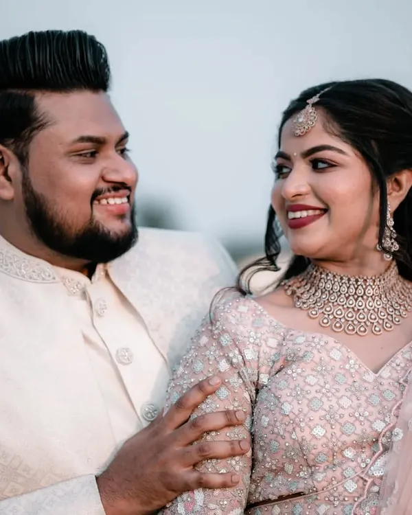 A candid moment of shared laughter between a couple during their engagement shoot. We believe the best photos come from genuine emotions.