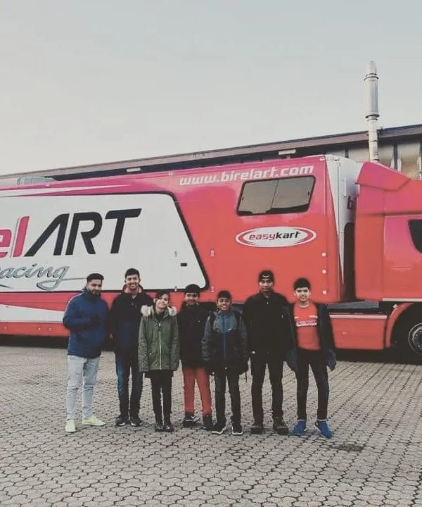 Our team of drivers in front of the official Birel ART Racing transporter truck during winter testing in Italy. This is the mobile headquarters for our European campaigns.