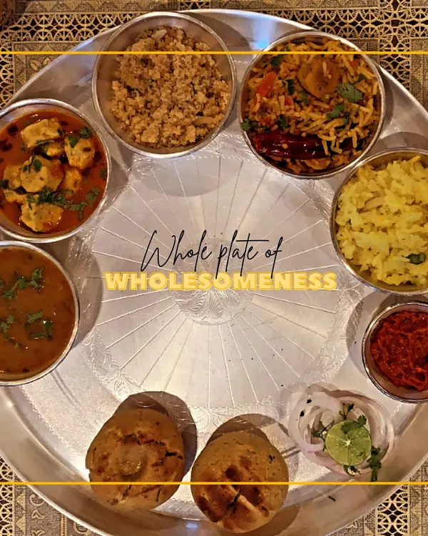 This is what a plate full of love and tradition looks like. Our Rajasthani thali features classics like baked baati, gatte ki sabzi, and churma, offering a complete, wholesome meal that tastes just like home.