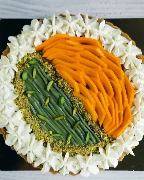 My Half & Half Mango Pistachio Cheesecake Tart is the best of both worlds. One side features sweet, fresh mango, while the other has a rich, nutty pistachio cream.