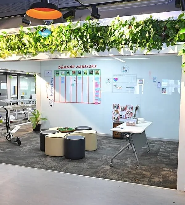 For the innovative team at Thoughtworks, we designed green installations that integrate seamlessly into their collaborative workspace. This living archway and vertical column utilize unused vertical space, acting as natural air purifiers and bringing the benefits of nature indoors.