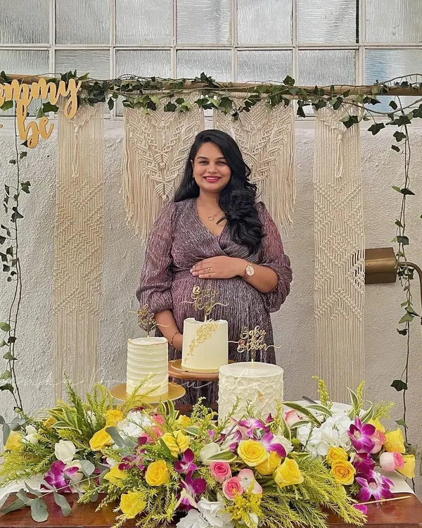 My beautiful mommy-to-be at her special baby shower. I designed this cozy and stylish corner with a macrame backdrop, lush florals, and a custom 'Mommy to be' sign to make her feel celebrated.