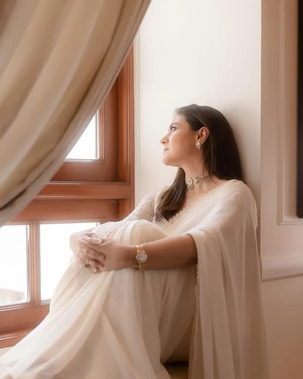 Simplicity can be the ultimate statement. I styled this classic white chiffon saree with a delicate hand-embroidered blouse and a simple choker, creating a look of timeless elegance inspired by iconic cinematic moments.