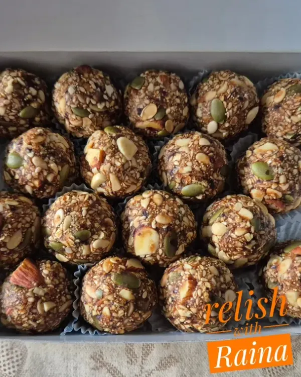 My Weight Loss Laddoos, also called Protein Laddoos or Energy Balls. Made without any ghee, they are packed with oats, peanuts, almonds, various seeds, and sweetened only with black dates for a low-calorie, high-energy snack.