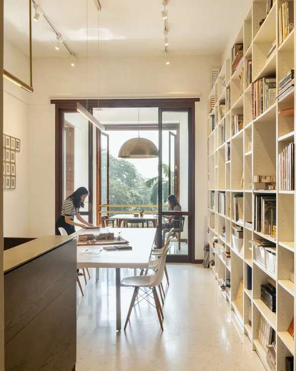 Our office is a space for co-creation. We follow a hybrid model with no designated desks, encouraging a shared sense of ownership. The long central table serves as a hub for team discussions, material exploration, and collaborative work.