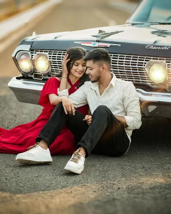 A classic love story with a vintage Chevrolet. The combination of the iconic car and the couple's romantic poses creates a timeless and cinematic pre-wedding photograph.