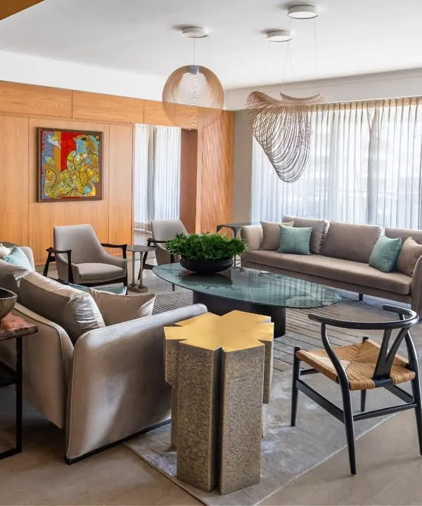 This expansive view of the Magnolia project captures our approach to holistic design. We create flowing spaces where living and dining areas are in conversation, unified by a palette of warm woods, bespoke furniture from our Koko collection, and curated art. It is a space designed not just for seeing, but for living in beautifully.