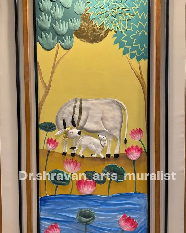 This piece combines the traditional Pichwai style with a modern relief technique. The cow, calf, and lotuses are sculpted to stand out from the surface, creating a beautiful 3D effect that adds depth and character to the artwork.