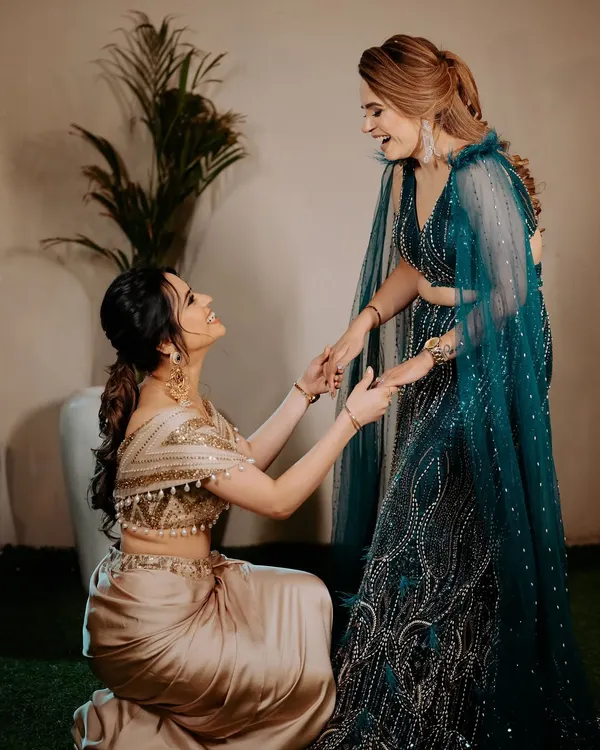 A beautiful, candid moment between my sagan bride and her sister. Both are glowing with happiness.