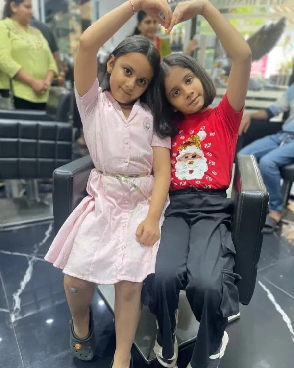 Cutest styles and happiest smiles. These two sisters are showing their love for their new matching bob haircuts. It's always a joy to have them in the salon.
