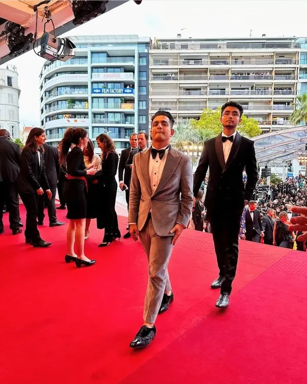 Another moment from the Cannes Film Festival red carpet. My bespoke black tuxedo is seen here, holding its own on an international stage.