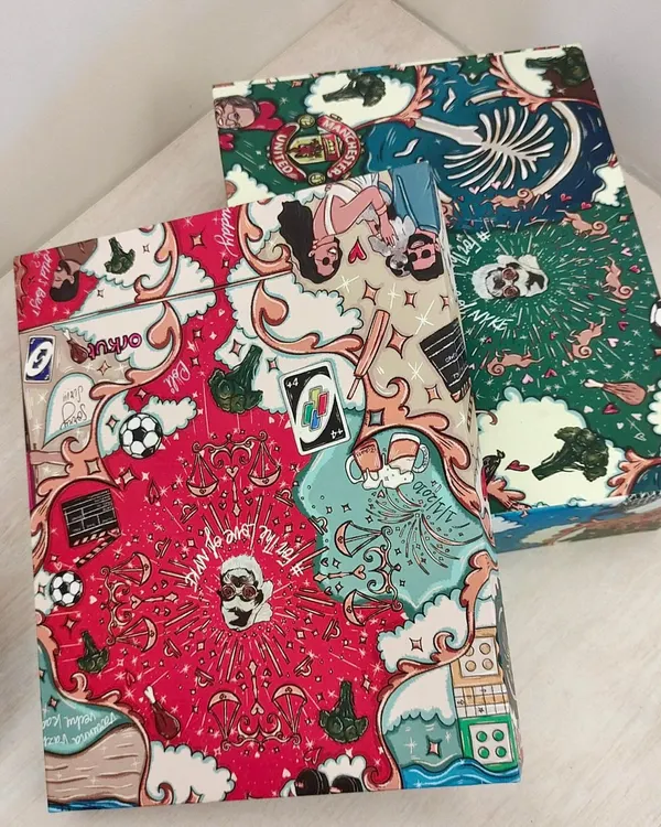 A look at the custom doodle art boxes I created as wedding return gifts for actress Keerthy Suresh. Each box tells the couple's story through unique illustrations, making it a deeply personal souvenir for guests.