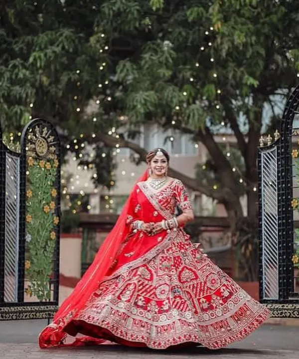 The quintessential bridal twirl in a stunning red lehenga. My focus here was on creating a luminous makeup look that felt fresh and radiant, even under the weight of traditional attire and a long day of ceremonies.