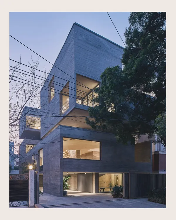 This is the Jenga House, a residence I designed in New Delhi. The structure is an assembly of stacked and shifted concrete volumes, creating a dynamic facade with recessed balconies and deep overhangs that sculpt light and shadow.
